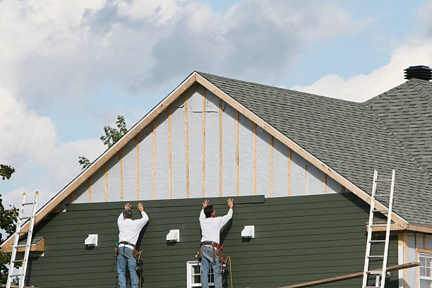 Professional Emergency Siding Repair technician working in Traphill, NC